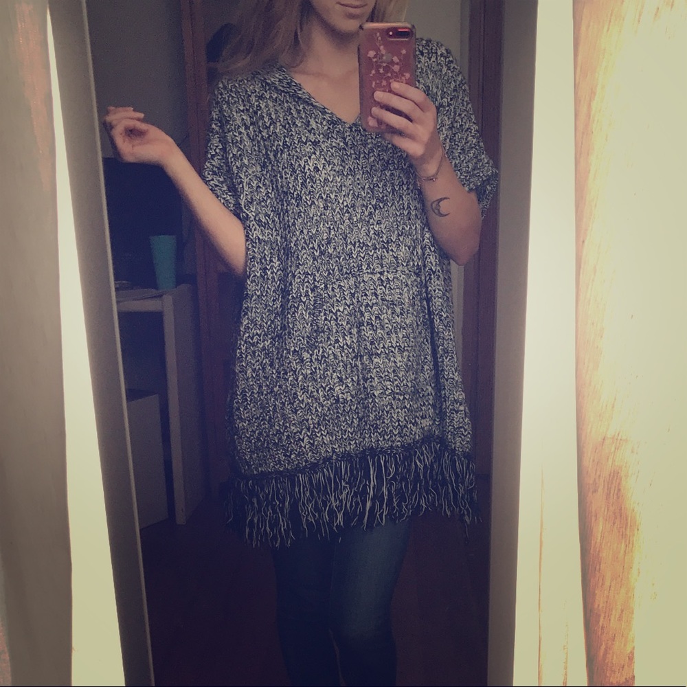 Black and white knitted poncho sweater